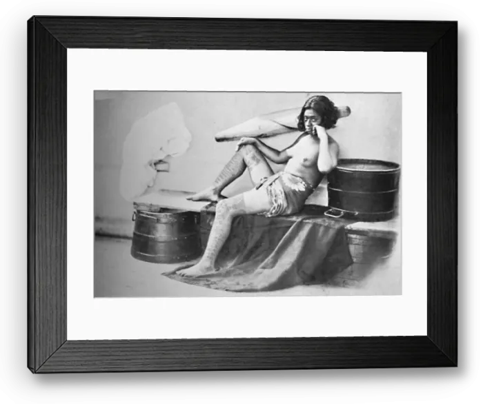 Framed Print : A Marquesa woman with the lower part of the legs fully tattooed, 1902 Framed Print : A Marquesa woman with the lower part of the legs fully tattooed, 1902