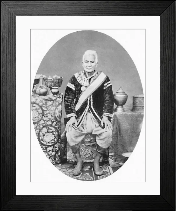 Framed Print : A Lao chief, 77 years old, In Siamese uniform, 1902. Artist: James McCarthy Framed Print : A Lao chief, 77 years old, In Siamese uniform, 1902. Artist: James McCarthy
