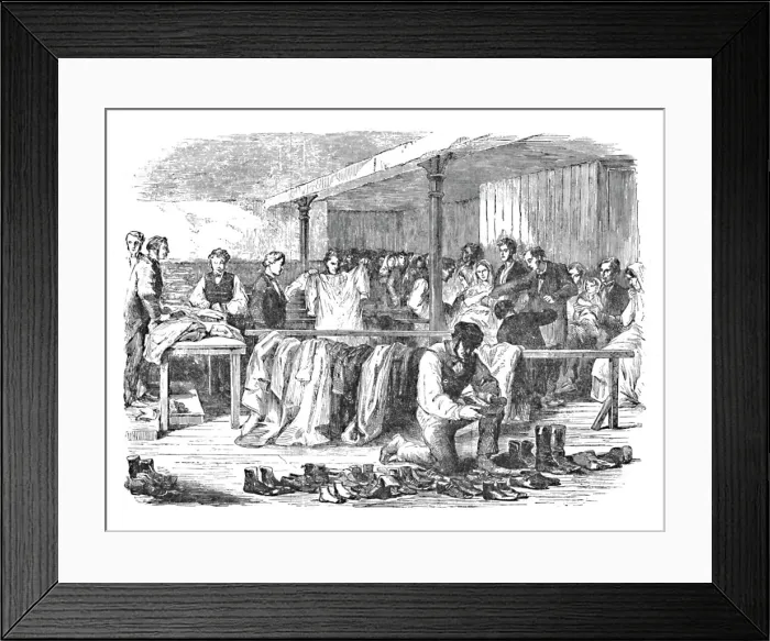 Framed Print : The Cotton Famine: Distribution of Clothes to Operatives, Manchester, 1904 Framed Print : The Cotton Famine: Distribution of Clothes to Operatives, Manchester, 1904