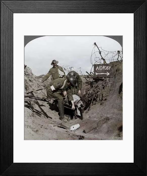 Framed Print : Carrying a wounded soldier to a first aid post, Passchendaele, Belgium, World War I, 1914-1918. Artist: Realistic Travels Publishers Framed Print : Carrying a wounded soldier to a first aid post, Passchendaele, Belgium, World War I, 1914-1918. Artist: Realistic Travels Publishers