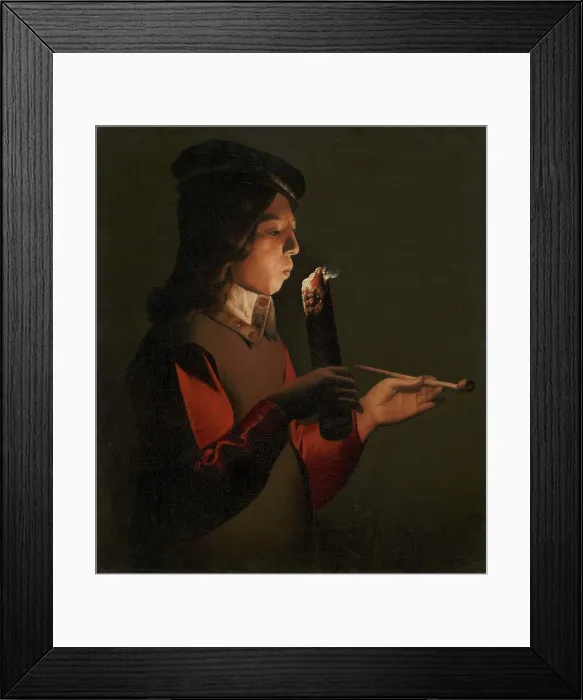 Framed Print : A young boy with a pipe, blowing on a firebrand, 1645-1648 Framed Print : A young boy with a pipe, blowing on a firebrand, 1645-1648