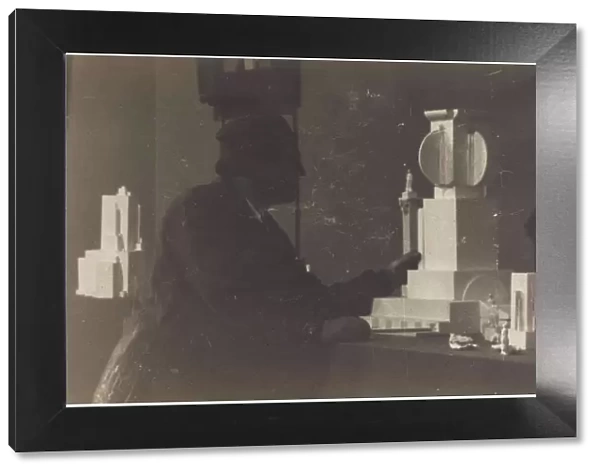Kazimir Malevich in his studio Artist: Anonymous