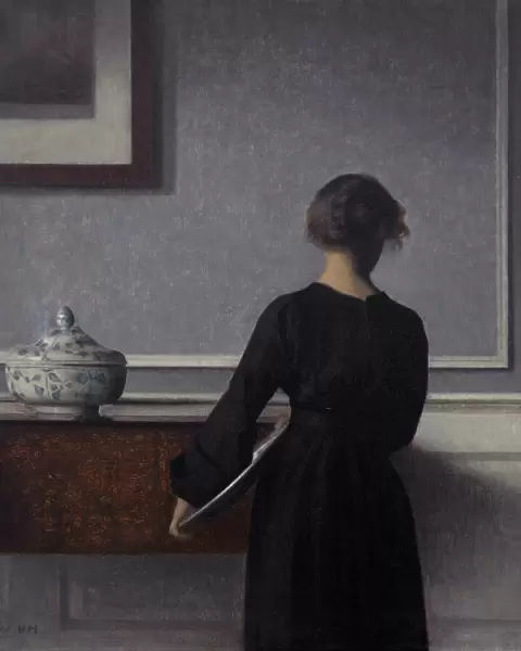 Interior with Young Woman from Behind. Artist: Hammershoi, Vilhelm (1864-1916)