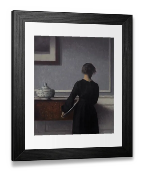 Framed Print : Interior with Young Woman from Behind. Artist: Hammershoi, Vilhelm (1864-1916)