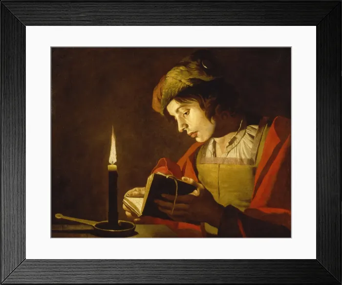 Framed Print : A Young Man Reading by Candlelight, c. 1630 Framed Print : A Young Man Reading by Candlelight, c. 1630