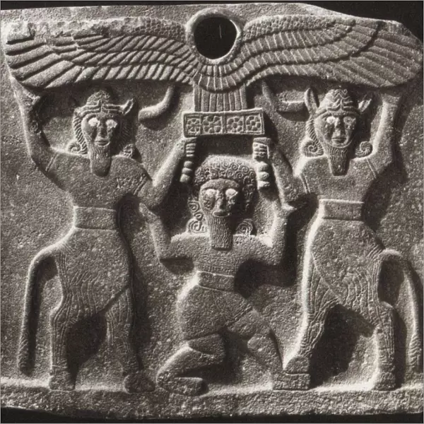 Orthostates depicting Gilgamesh between two minotaur demigods holding up the sun disc. From Tell Hal