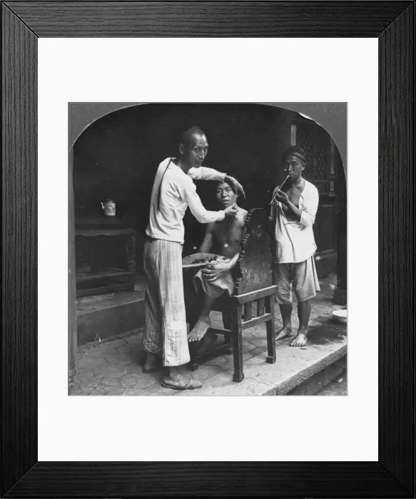 Framed Print : A Chinese barber at Bhamo, Burma, 1908. Artist: Stereo Travel Co Framed Print : A Chinese barber at Bhamo, Burma, 1908. Artist: Stereo Travel Co
