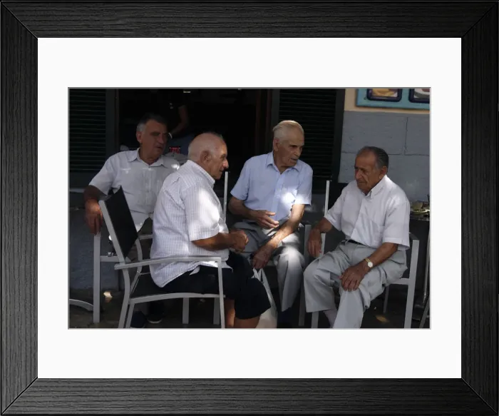 Framed Print : Group of men chatting at Pollensa Sunday market, Mallorca, Spain Framed Print : Group of men chatting at Pollensa Sunday market, Mallorca, Spain
