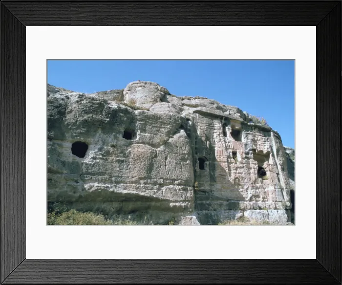 Framed Print : Assyrian rock reliefs pitted by Chr hermit caves, Bavian, Iraq, 1977 Framed Print : Assyrian rock reliefs pitted by Chr hermit caves, Bavian, Iraq, 1977