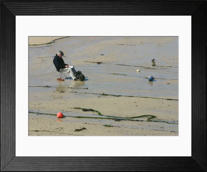 Framed Print : Man sitting on the sand in St Ives harbour at low tide, Cornwall Framed Print : Man sitting on the sand in St Ives harbour at low tide, Cornwall