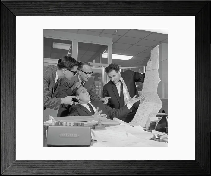 Framed Print : A salesman gets a helping hand in checking the figures, 1967. Artist: Michael Walters Framed Print : A salesman gets a helping hand in checking the figures, 1967. Artist: Michael Walters