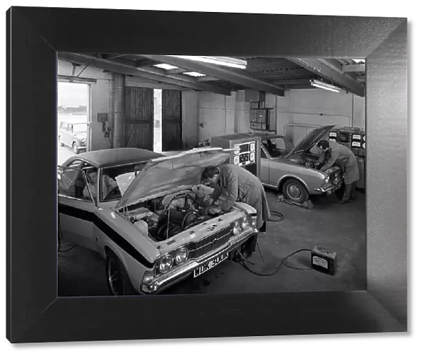 Cortina Mk 2 and Mk3 GT in a garage being serviced  /  modified, 1972