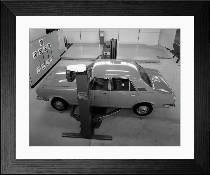 Framed Print : Ford Zodiac on an asymmetric lift, Sheffield, South Yorkshire, 1972 Framed Print : Ford Zodiac on an asymmetric lift, Sheffield, South Yorkshire, 1972
