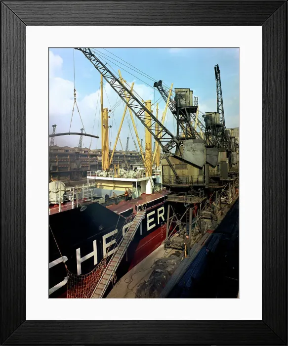Framed Print : The Manchester Renown being loaded with steel for export, Manchester, 1964. Artist Framed Print : The Manchester Renown being loaded with steel for export, Manchester, 1964. Artist