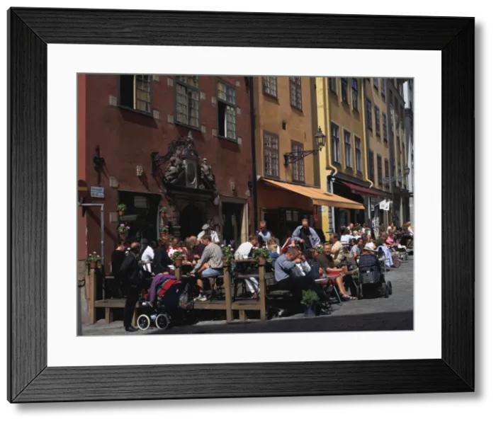 Framed Print : Cafe and colourful houses, Stortorget Square, Stockholm, Sweden Framed Print : Cafe and colourful houses, Stortorget Square, Stockholm, Sweden