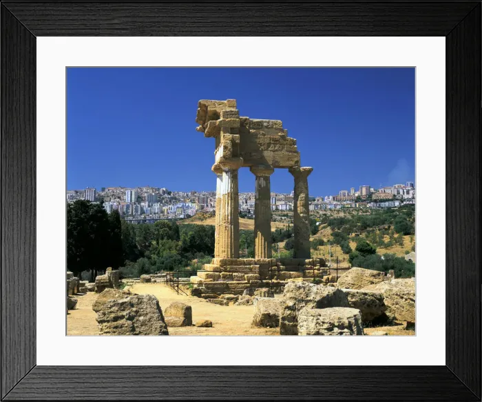 Framed Print : Temple of Diosuri, Agrigento, Sicily, Italy. Agrigento town behind Framed Print : Temple of Diosuri, Agrigento, Sicily, Italy. Agrigento town behind