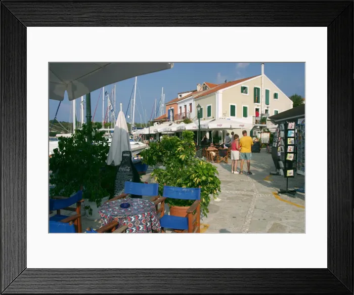 Framed Print : Restaurant on the waterfront in Fiskardo harbour, Kefalonia, Greece Framed Print : Restaurant on the waterfront in Fiskardo harbour, Kefalonia, Greece