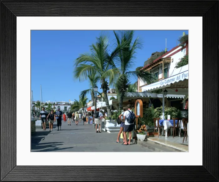 Framed Print : Tourists checking out a restaurant menu, Puerto de Mogan, Gran Canaria, Canary Islands Framed Print : Tourists checking out a restaurant menu, Puerto de Mogan, Gran Canaria, Canary Islands