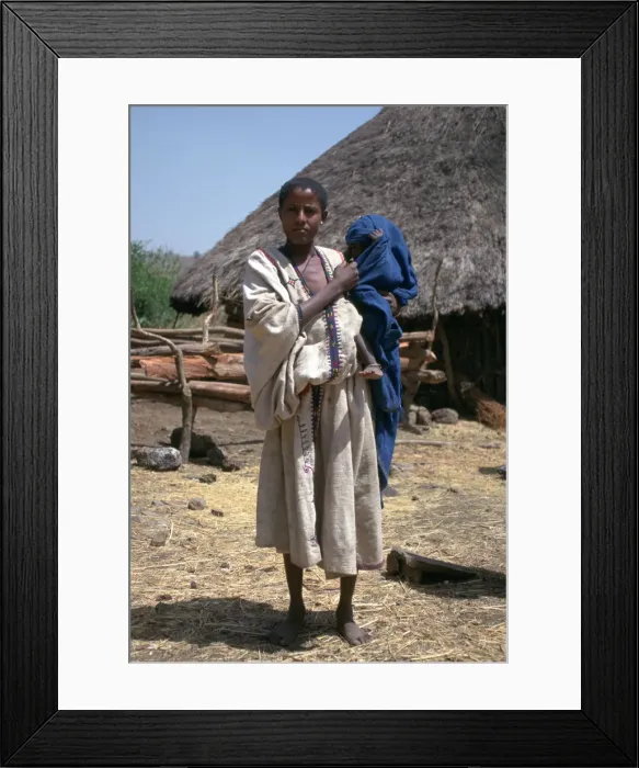 Framed Print : Woman and baby in a village near the Blue Nile Falls, Ethiopia Framed Print : Woman and baby in a village near the Blue Nile Falls, Ethiopia
