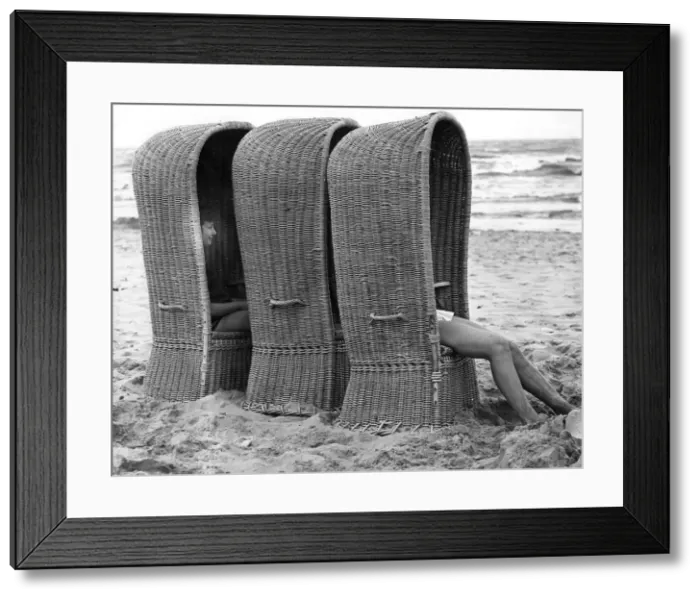 Framed Print : Basket shelters on a beach in Belgium, 1966 Framed Print : Basket shelters on a beach in Belgium, 1966