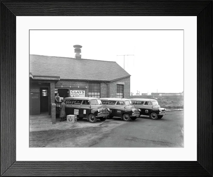 Framed Print : Austin vans being loaded outside Clays TV repair depot, Mexborough, South Yorkshire, 1959 Framed Print : Austin vans being loaded outside Clays TV repair depot, Mexborough, South Yorkshire, 1959
