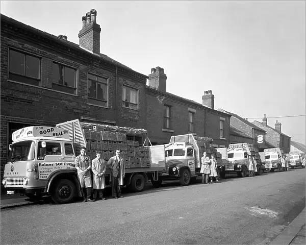 Fleet of soft drinks delivery lorries, Mexborough, South Yorkshire, 1961. Artist