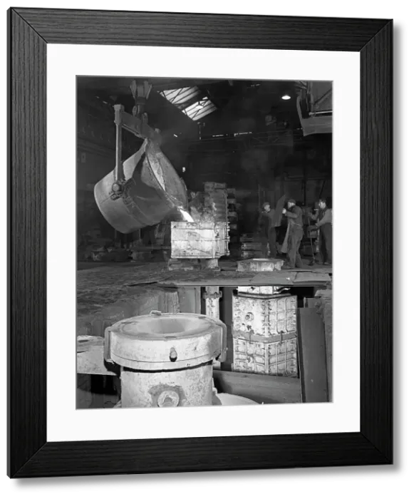 Framed Print : Teeming iron at Wombwell foundry, South Yorkshire, 1963. Artist: Michael Walters Framed Print : Teeming iron at Wombwell foundry, South Yorkshire, 1963. Artist: Michael Walters