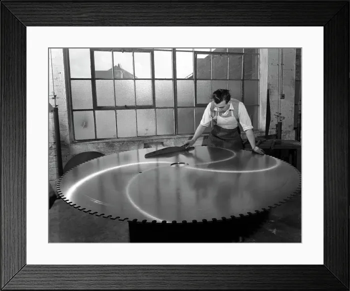 Framed Print : Quality checking a giant saw blade, Edgar Allens steel foundry, Sheffield, South Yorkshire, 1963 Framed Print : Quality checking a giant saw blade, Edgar Allens steel foundry, Sheffield, South Yorkshire, 1963