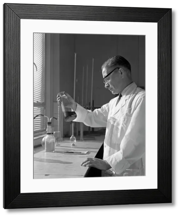 Framed Print : Lab technician at a steelworks in Sheffield, South Yorkshire, 1963 Framed Print : Lab technician at a steelworks in Sheffield, South Yorkshire, 1963