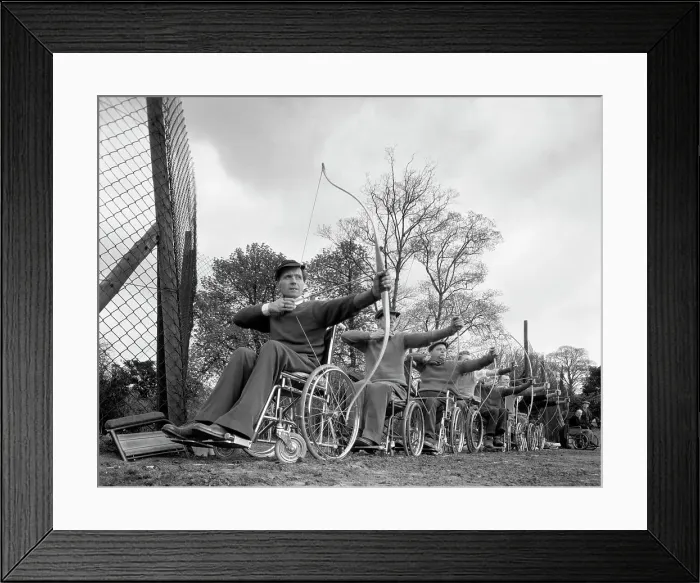 Framed Print : Archery practice at the CISWO paraplegic centre, Pontefract, West Yorkshire, 1960