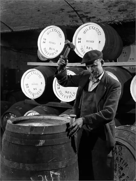 Coopering, making whiskey barrels at Wiley & Co, Sheffield, South Yorkshire, 1961