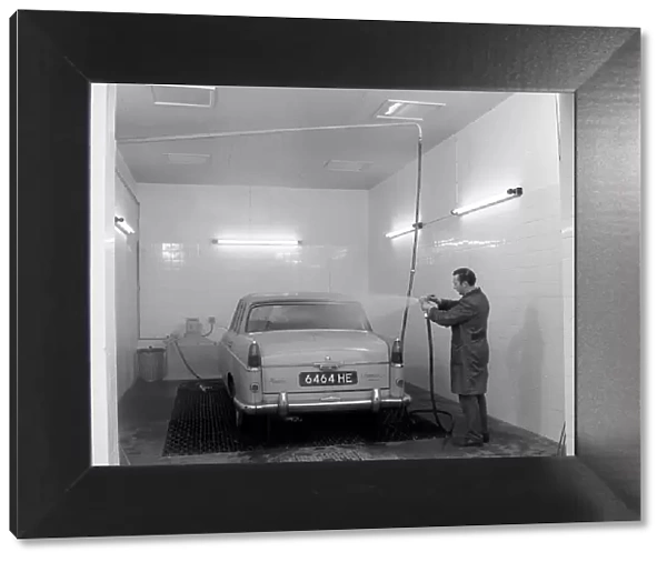 A 1961 Austin Westminster in a car wash, Grimsby, 1965. Artist: Michael Walters