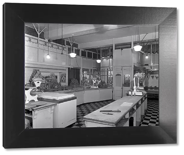 Interior of the Butchery Department, Barnsley Co-op, South Yorkshire, 1956. Artist