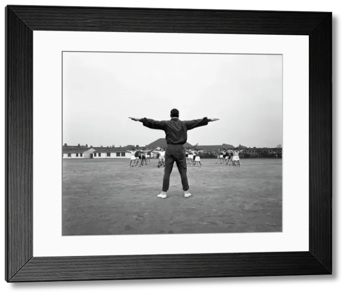 Framed Print : Games master taking a gym class, Airedale school, Castleford, West Yorkshire, 1962 Framed Print : Games master taking a gym class, Airedale school, Castleford, West Yorkshire, 1962