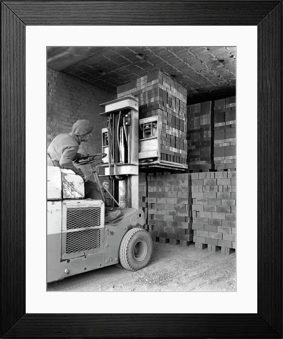 Framed Print : A yardsman stacking pallets of bricks, Whitwick Brickworks, Coalville, Leicestershire, 1963