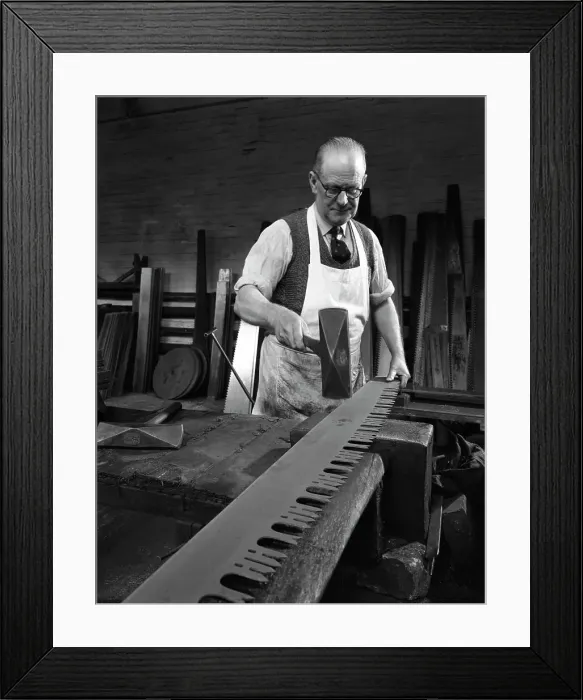 Framed Print : Tensioning the crosscut on a two metre saw blade, Sheffield, South Yorkshire, 1963 Framed Print : Tensioning the crosscut on a two metre saw blade, Sheffield, South Yorkshire, 1963
