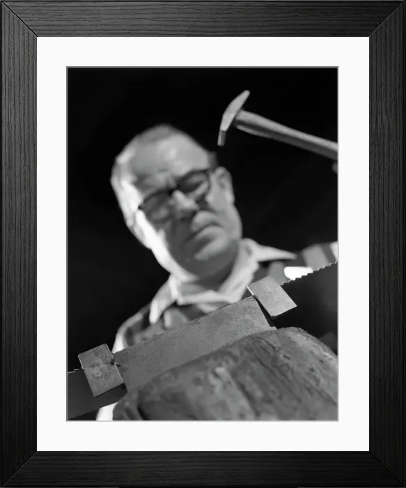 Framed Print : Setting the saw teeth on a hand saw blade, Sheffield, South Yorkshire, 1963. Artist Framed Print : Setting the saw teeth on a hand saw blade, Sheffield, South Yorkshire, 1963. Artist