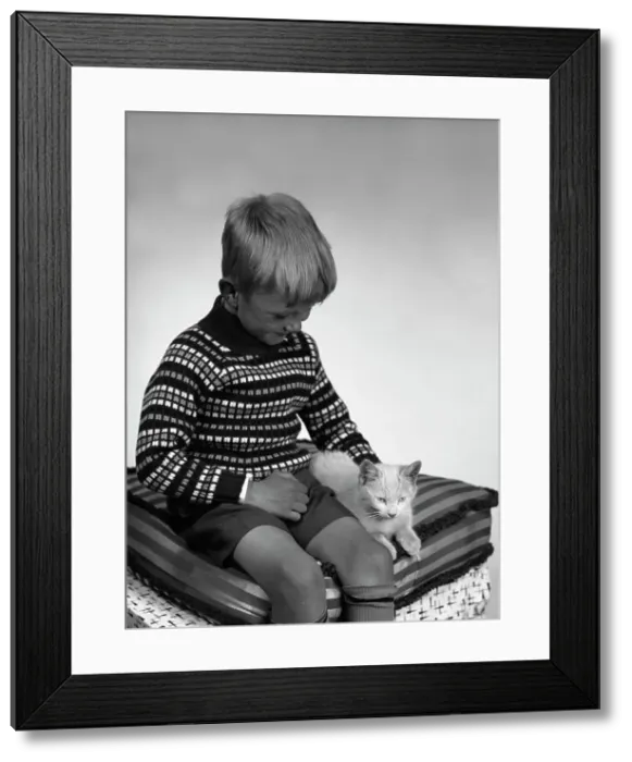 Framed Print : Child with a cat, 1963. Artist: Michael Walters Framed Print : Child with a cat, 1963. Artist: Michael Walters