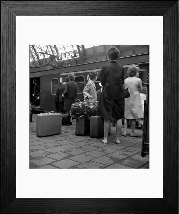 Framed Print : Passengers on a platform at Centraal Station, Amsterdam, Netherlands, 1963. Artist Framed Print : Passengers on a platform at Centraal Station, Amsterdam, Netherlands, 1963. Artist