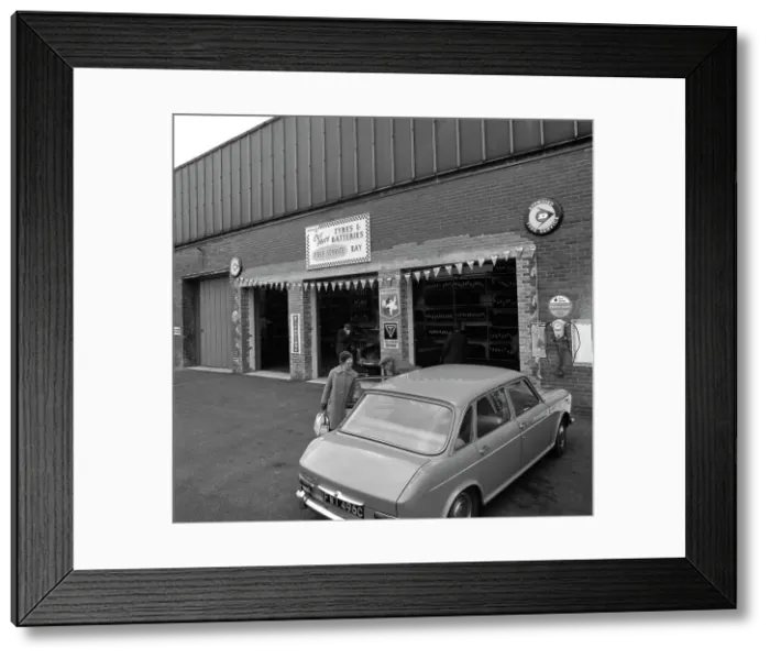 Framed Print : Mk 1 BMC Austin 1800 outside a tyre fitting bay in Rotherham, South Yorkshire, 1969 Framed Print : Mk 1 BMC Austin 1800 outside a tyre fitting bay in Rotherham, South Yorkshire, 1969