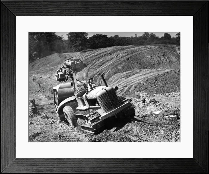 Framed Print : Tractor unit pulling an earth grading machine at a site near Rotherham, South Yorkshire, 1954 Framed Print : Tractor unit pulling an earth grading machine at a site near Rotherham, South Yorkshire, 1954