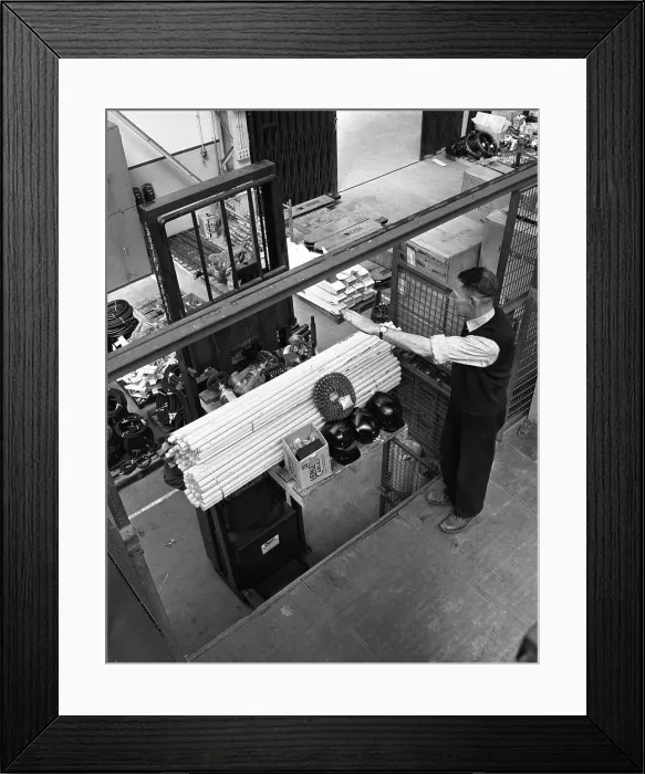 Framed Print : Warehouseman loading a fork lift truck in the stores, Bestwood Colliery, Nottinghamshire, 1962 Framed Print : Warehouseman loading a fork lift truck in the stores, Bestwood Colliery, Nottinghamshire, 1962