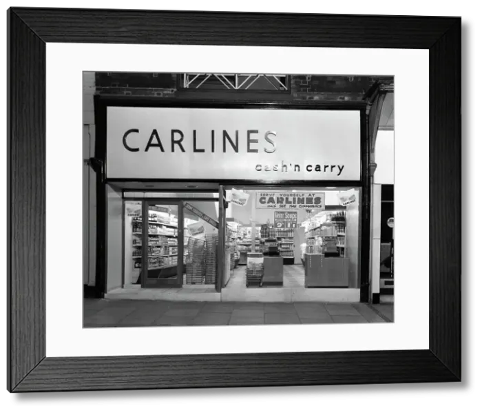 Framed Print : The exterior of Carlines Self Service Store, Mexborough, South Yorkshire, 1960. Artist Framed Print : The exterior of Carlines Self Service Store, Mexborough, South Yorkshire, 1960. Artist