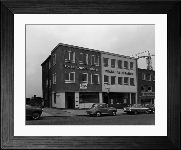 Framed Print : Morris Minor and a Triumph Herald outside the Royal Insurance Building, Rotherham,s Yorks, 1962 Framed Print : Morris Minor and a Triumph Herald outside the Royal Insurance Building, Rotherham,s Yorks, 1962