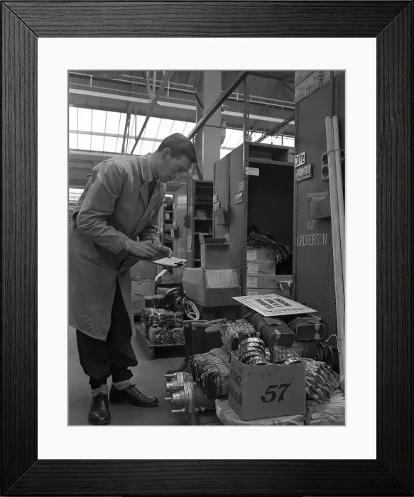 Framed Print : Warehouseman checking stock in the stores at Bestwood Colliery, North Nottinghamshire, 1962 Framed Print : Warehouseman checking stock in the stores at Bestwood Colliery, North Nottinghamshire, 1962