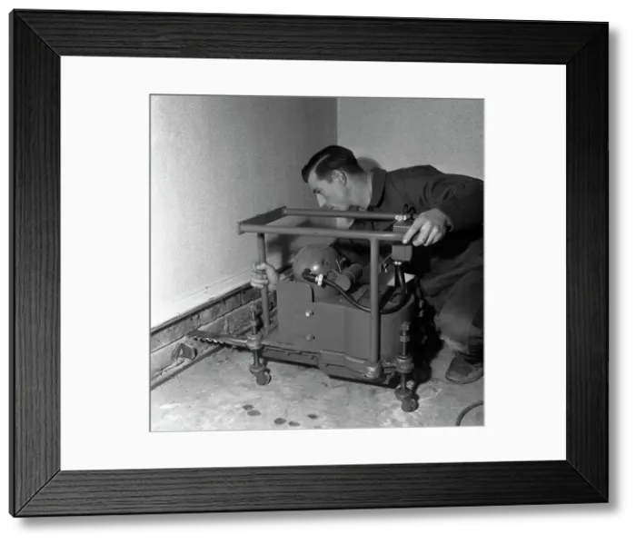 Framed Print : Installing a damp proof course in a house in Goldthorpe, South Yorkshire, 1957. Artist Framed Print : Installing a damp proof course in a house in Goldthorpe, South Yorkshire, 1957. Artist