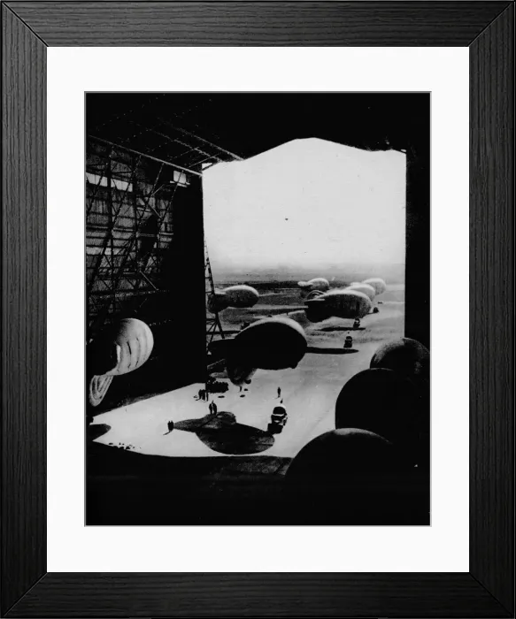 Framed Print : Putting barrage ballons into a hangar, 1943 Framed Print : Putting barrage ballons into a hangar, 1943