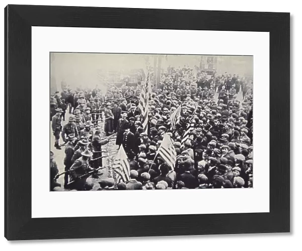 Armed troops confronting protesters during an industrial dispute, USA, 1912. Artist