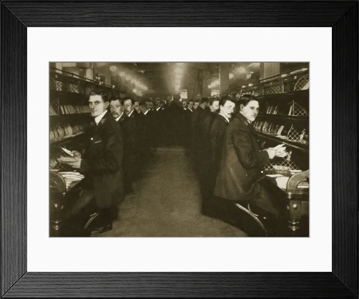 Framed Print : Staff sorting letters at the Post Office, Mount Pleasant, London, 20th century. Artist