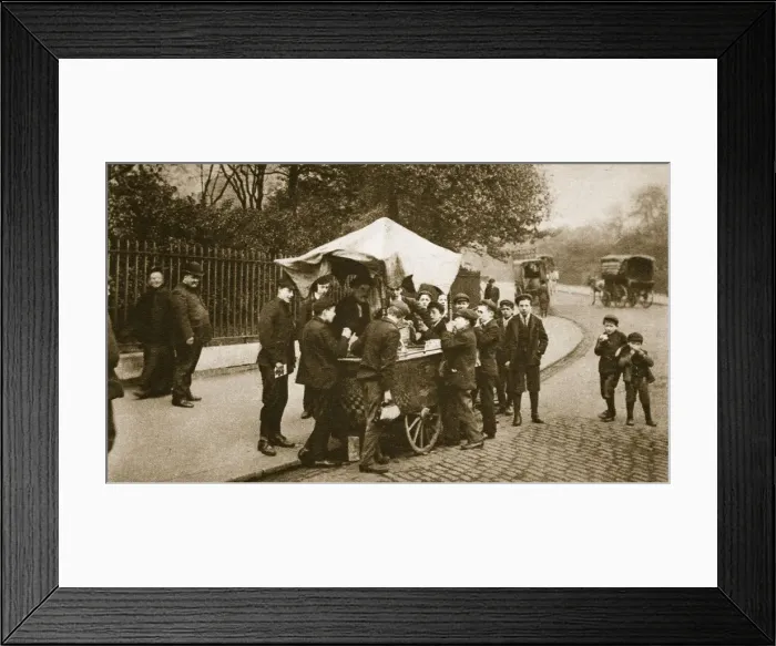 Framed Print : Children buying ice-cream from an Italian trader, 20th century Framed Print : Children buying ice-cream from an Italian trader, 20th century